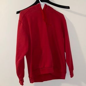 Red medium hoodie and large white zip up